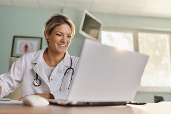 Physician on computer